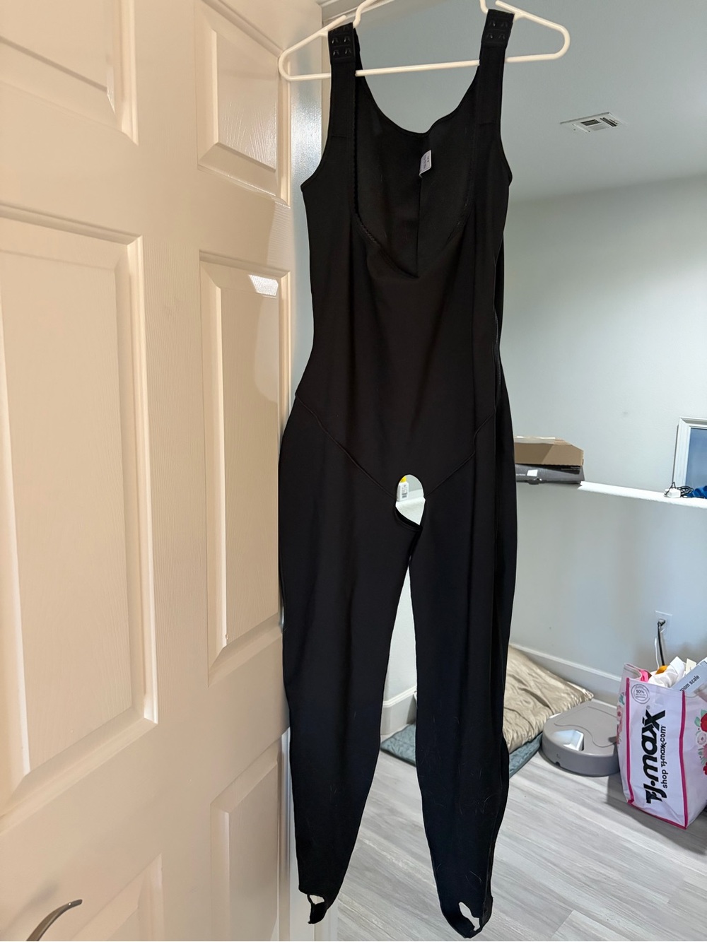 Black Women’s Shapewear Bodysuit with Adjustable Straps and side zipper.